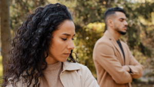 A woman and a man thinking about their toxic behaviors