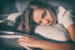 A woman experiencing depression and insomnia