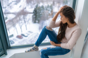 A woman experiencing seasonal affective disorder